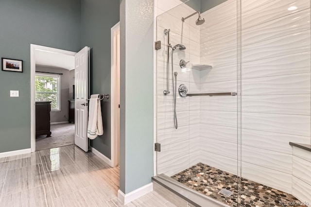 16341 Maple Rock Ct, Parker, CO 80134 - bathroom with a shower stall and baseboards