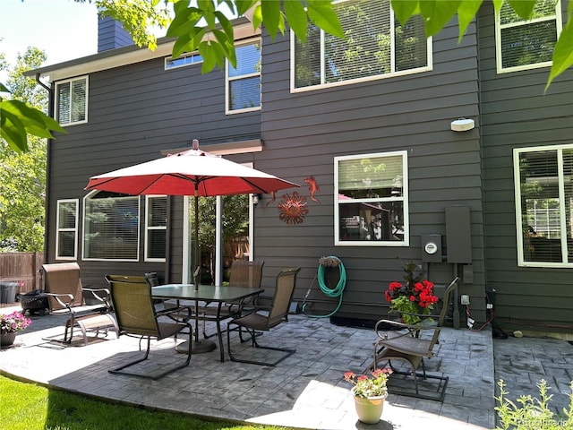 16341 Maple Rock Ct, Parker, CO 80134 - back of property featuring a patio area, a chimney, and outdoor dining area