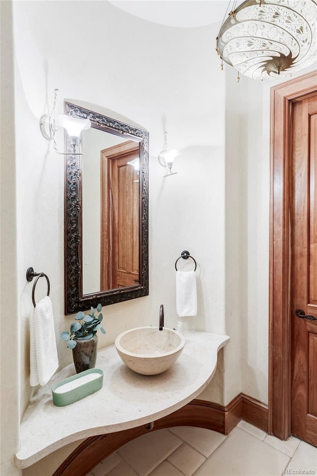 bathroom featuring a sink and tile patterned floors