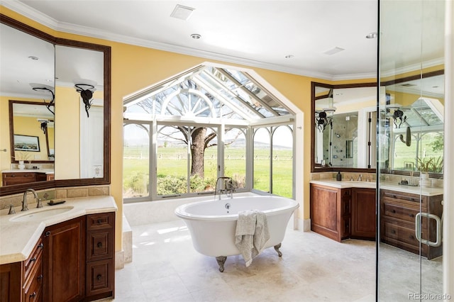 full bathroom with a soaking tub, two vanities, crown molding, and a stall shower