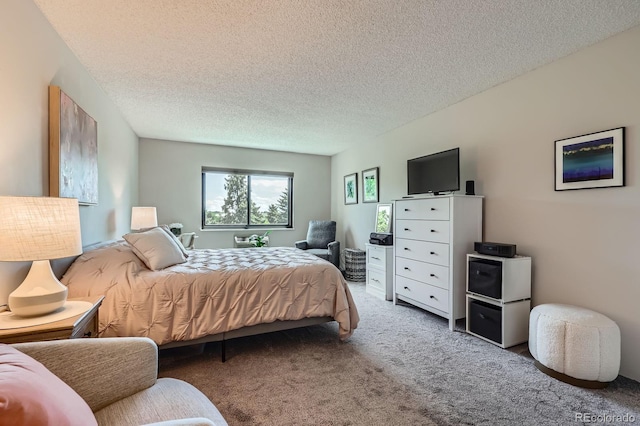 14390 E Marina Dr Unit 403, Aurora, CO 80014 - bedroom featuring carpet flooring and a textured ceiling