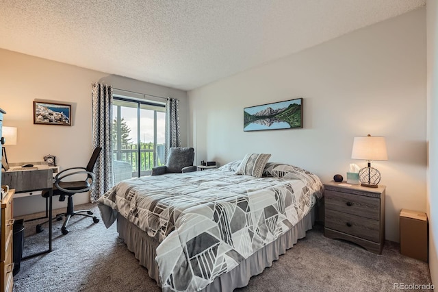 14390 E Marina Dr Unit 403, Aurora, CO 80014 - bedroom with carpet flooring, access to exterior, and a textured ceiling