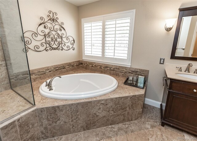 1530 Woodrose Ct, Colorado Springs, CO 80921 - full bath with a garden tub and vanity