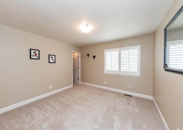 1530 Woodrose Ct, Colorado Springs, CO 80921 - spare room featuring light colored carpet and baseboards
