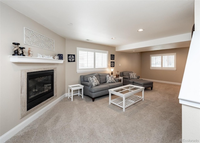 1530 Woodrose Ct, Colorado Springs, CO 80921 - living area featuring a fireplace, carpet, baseboards, and recessed lighting