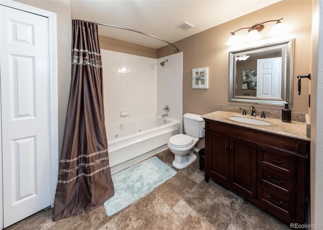 1530 Woodrose Ct, Colorado Springs, CO 80921 - bathroom with shower / tub combo, toilet, vanity, and stone finish flooring