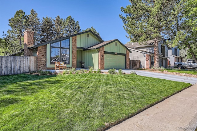8820 W 80th Dr, Arvada, CO 80005 - mid-century modern home with board and batten siding, an attached garage, concrete driveway, brick siding, and a chimney