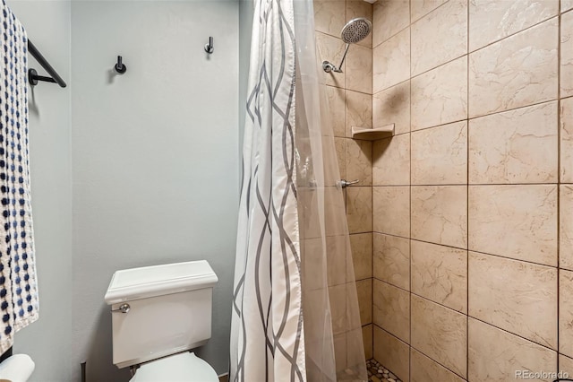 8820 W 80th Dr, Arvada, CO 80005 - bathroom featuring a shower stall and toilet