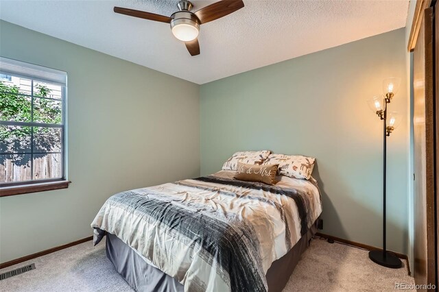 8820 W 80th Dr, Arvada, CO 80005 - bedroom featuring carpet, baseboards, and ceiling fan