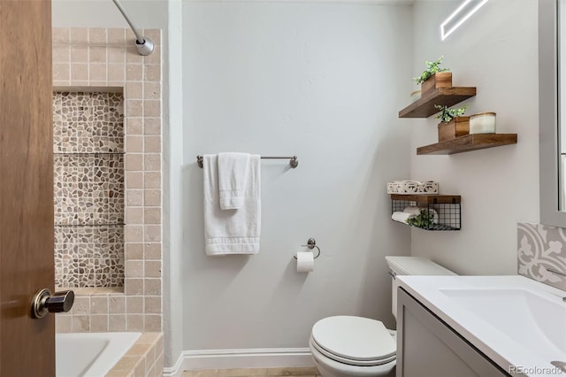 8820 W 80th Dr, Arvada, CO 80005 - bathroom with toilet, tiled shower, tiled bath, and vanity