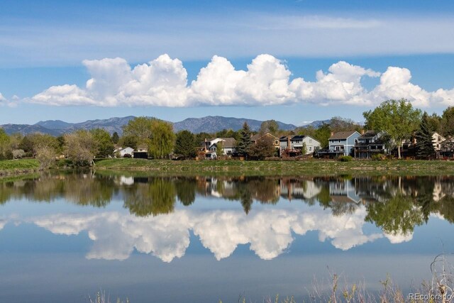 8820 W 80th Dr, Arvada, CO 80005 - water view with mountains and nearby suburban area