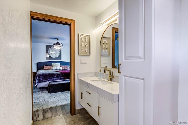 bathroom featuring hardwood / wood-style flooring and vanity