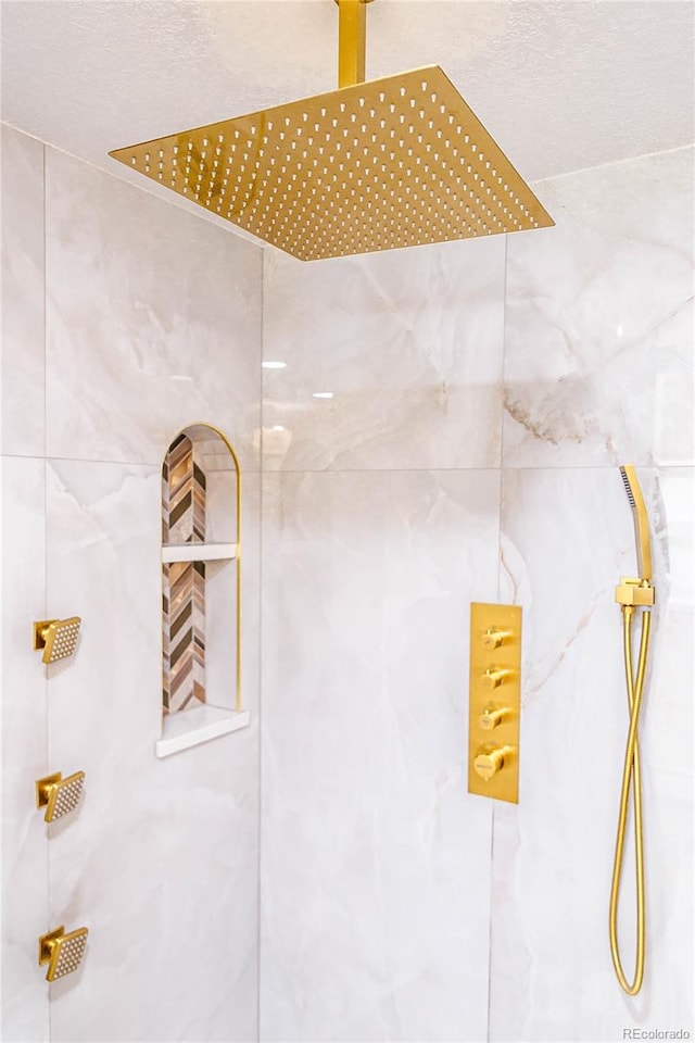 details with a tile shower