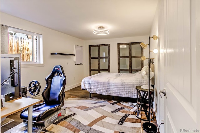 bedroom featuring light wood-type flooring