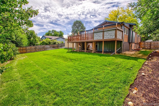 view of yard with a deck