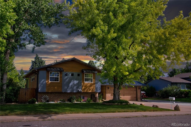 view of front of home featuring a yard