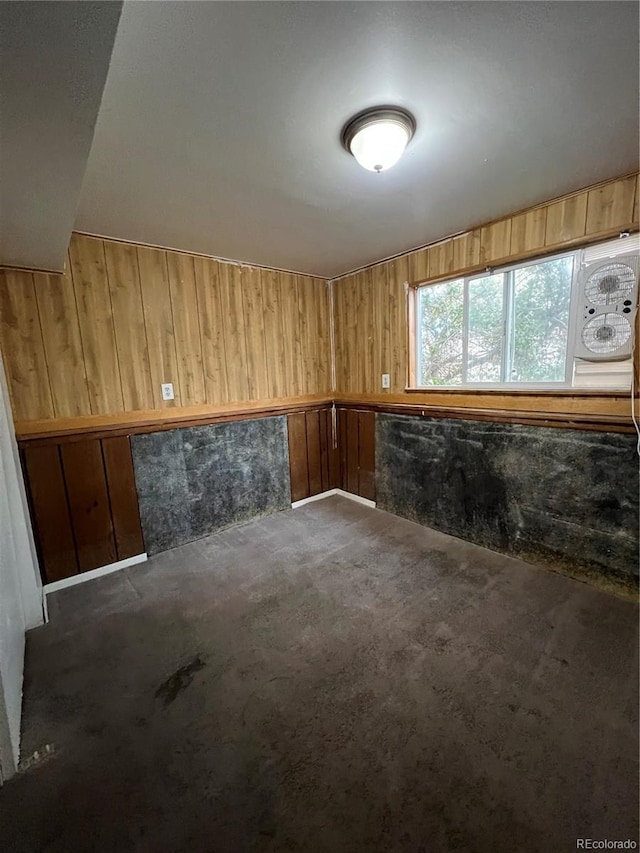 16032 E Floyd Ave, Aurora, CO 80013 - carpeted spare room featuring wooden walls