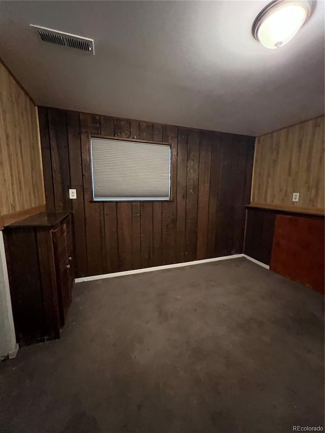 16032 E Floyd Ave, Aurora, CO 80013 - carpeted empty room featuring wooden walls