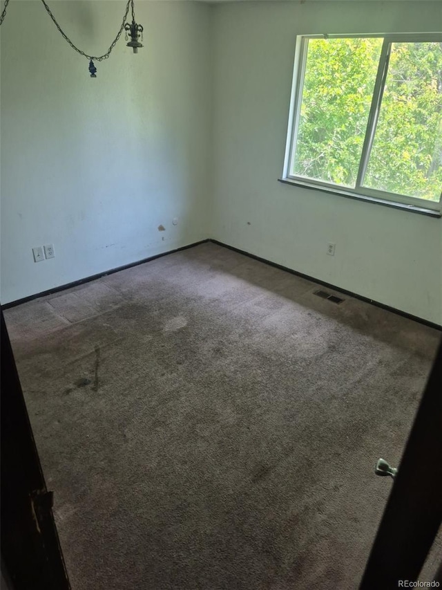 16032 E Floyd Ave, Aurora, CO 80013 - unfurnished room featuring carpet flooring and baseboards