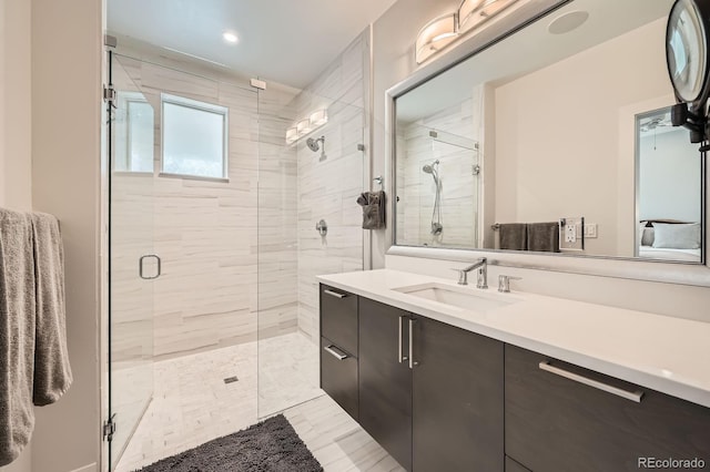 427 Milwaukee St, Denver, CO 80206 - full bathroom with vanity, recessed lighting, and a stall shower