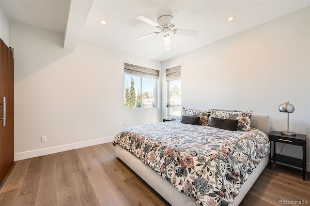 427 Milwaukee St, Denver, CO 80206 - bedroom featuring recessed lighting, baseboards, and wood finished floors