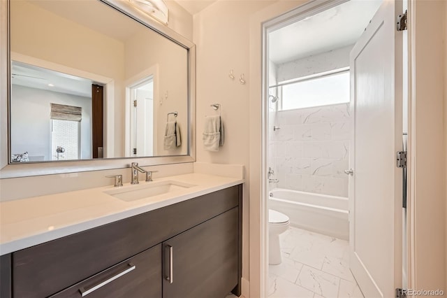 427 Milwaukee St, Denver, CO 80206 - full bathroom featuring shower / bath combination, vanity, baseboards, toilet, and marble finish floor