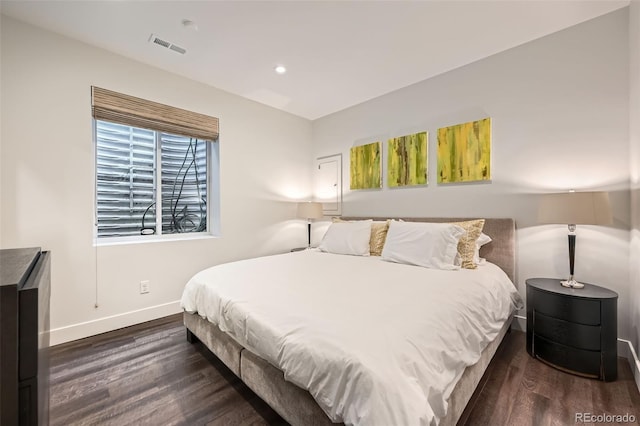 427 Milwaukee St, Denver, CO 80206 - bedroom with recessed lighting, baseboards, and dark wood-style flooring