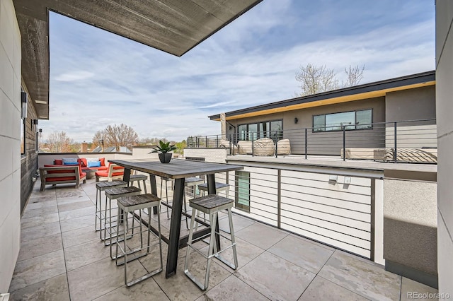 427 Milwaukee St, Denver, CO 80206 - view of patio with an outdoor hangout area and a balcony