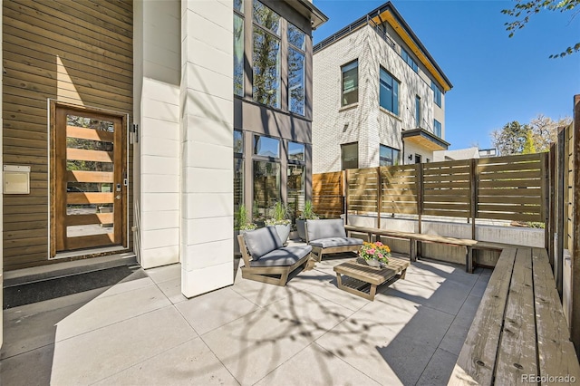 427 Milwaukee St, Denver, CO 80206 - view of patio / terrace with an outdoor hangout area and fence