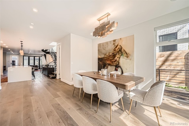 427 Milwaukee St, Denver, CO 80206 - dining room with recessed lighting and light wood-type flooring