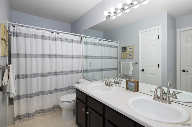 13777 W Amherst Way, Lakewood, CO 80228 - full bath with toilet, double vanity, a shower with curtain, and tile patterned floors