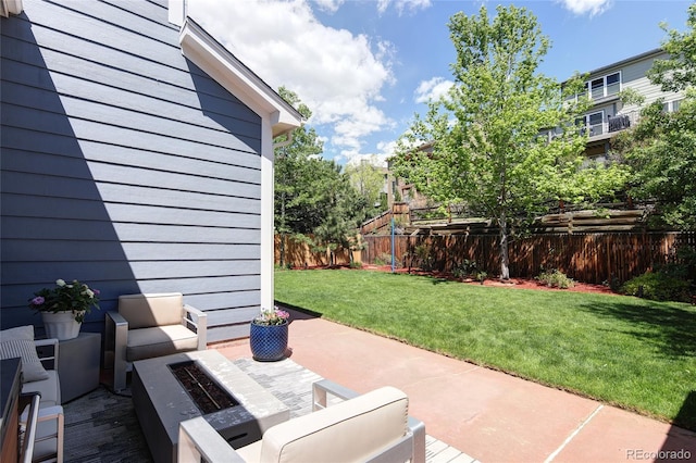 13777 W Amherst Way, Lakewood, CO 80228 - view of patio with an outdoor fire pit