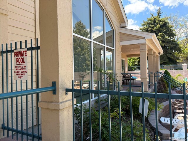 1148 Opal St Unit 101, Broomfield, CO 80020 - view of home's exterior with fence