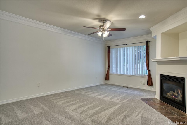 930 Button Rock Dr Unit 29, Longmont, CO 80504 - unfurnished living room with carpet, ceiling fan, crown molding, a fireplace with flush hearth, and recessed lighting