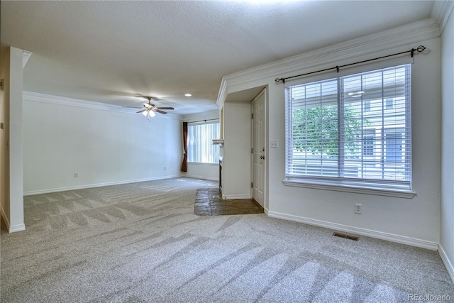 930 Button Rock Dr Unit 29, Longmont, CO 80504 - carpeted empty room with ornamental molding and a ceiling fan