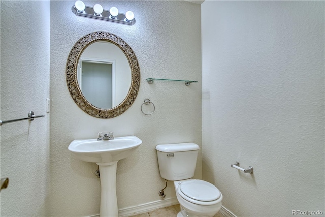 930 Button Rock Dr Unit 29, Longmont, CO 80504 - bathroom with toilet and tile patterned flooring