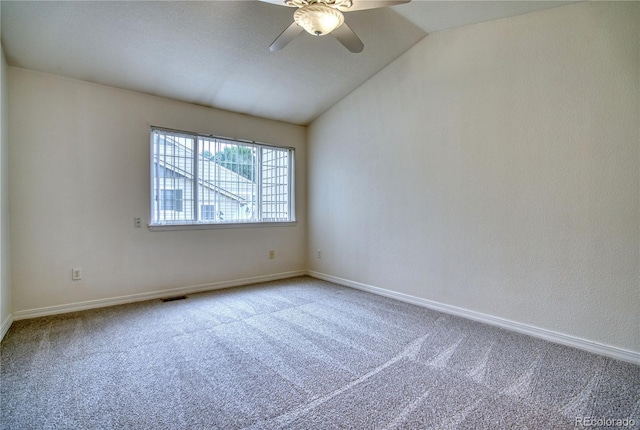 930 Button Rock Dr Unit 29, Longmont, CO 80504 - unfurnished room featuring vaulted ceiling, carpet floors, and a ceiling fan