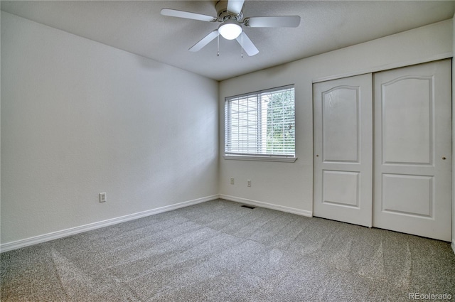 930 Button Rock Dr Unit 29, Longmont, CO 80504 - unfurnished bedroom featuring carpet floors, a closet, and ceiling fan