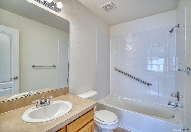 930 Button Rock Dr Unit 29, Longmont, CO 80504 - bathroom featuring vanity, shower / washtub combination, and a textured wall