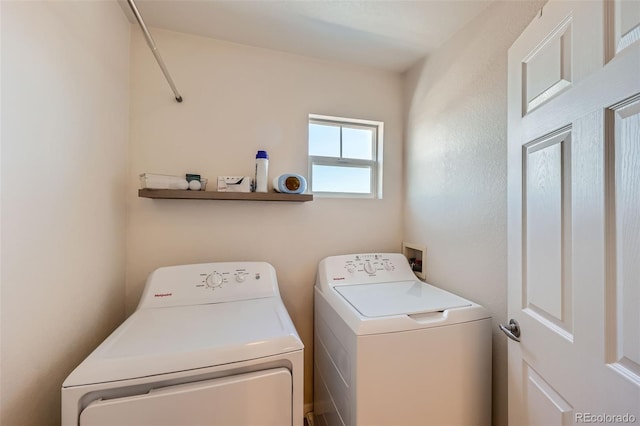 laundry room featuring laundry area and washing machine and clothes dryer