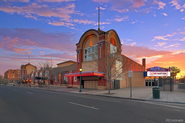view of property at dusk