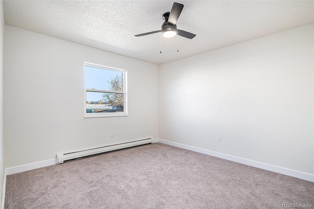 carpeted empty room featuring baseboard heating, a textured ceiling, and ceiling fan