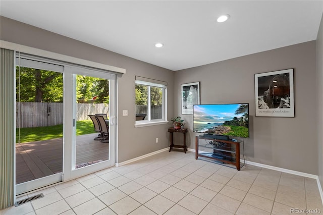 6143 S Ash Cir E, Centennial, CO 80121 - living area with recessed lighting and light tile patterned flooring