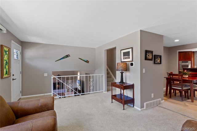 6143 S Ash Cir E, Centennial, CO 80121 - living room with carpet flooring
