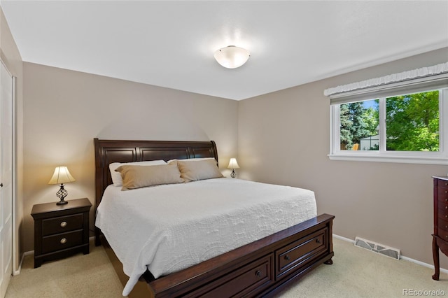 6143 S Ash Cir E, Centennial, CO 80121 - bedroom with light carpet and baseboards