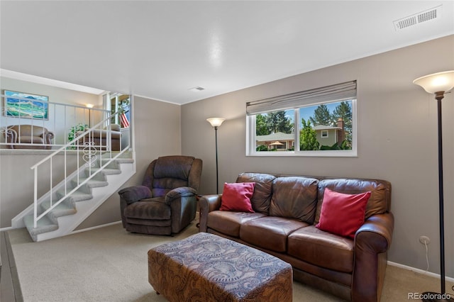 6143 S Ash Cir E, Centennial, CO 80121 - carpeted living room with stairway and baseboards