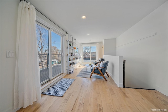 interior space featuring light wood-type flooring and recessed lighting