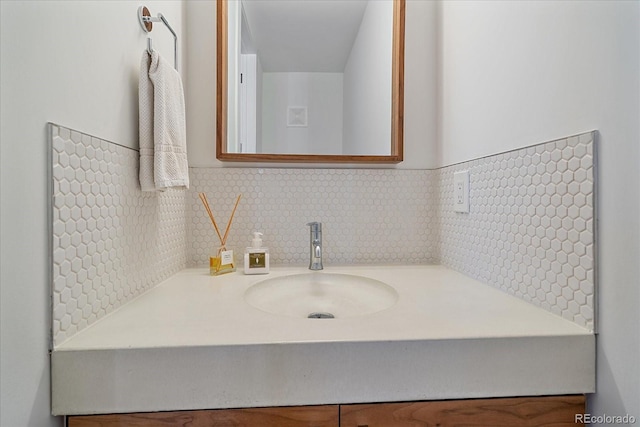 bathroom featuring backsplash and vanity