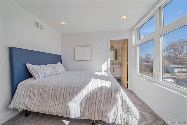 bedroom featuring recessed lighting, carpet flooring, visible vents, and baseboards