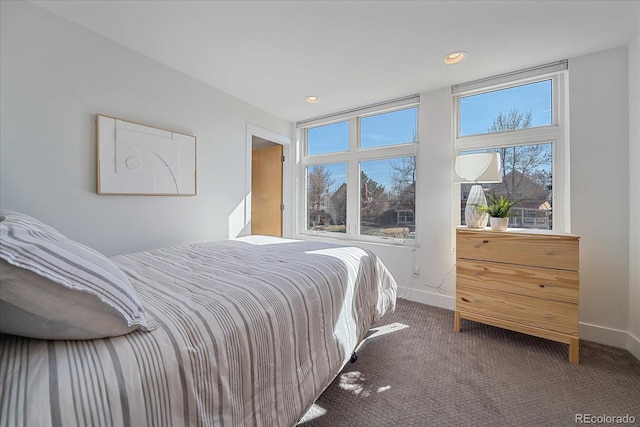 carpeted bedroom with baseboards and recessed lighting